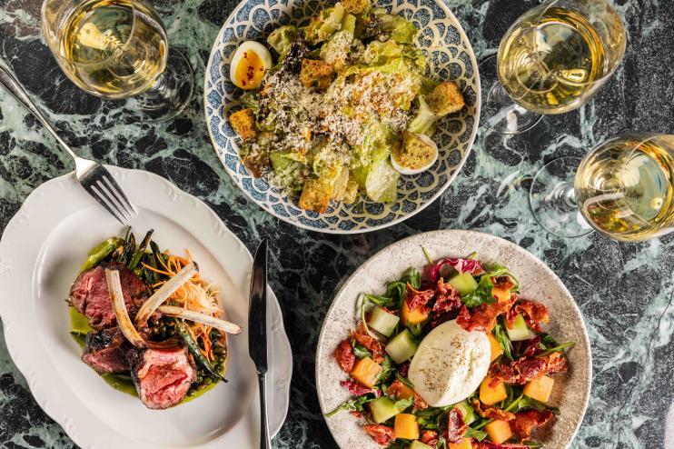 A table full of brunch dishes CATCH.