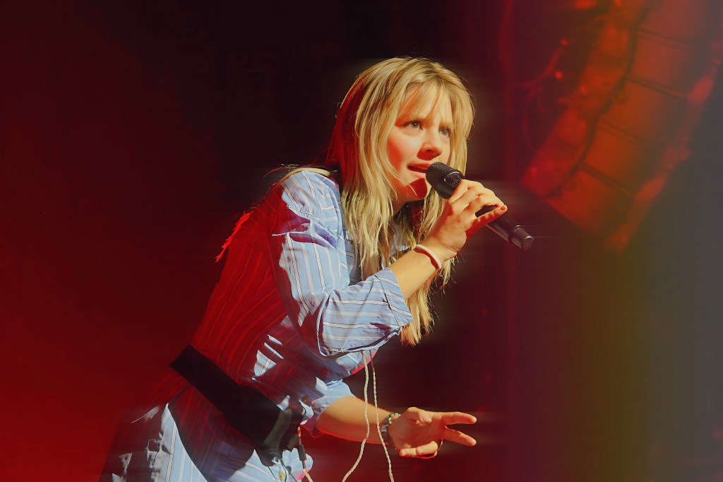 Woman performing on stage