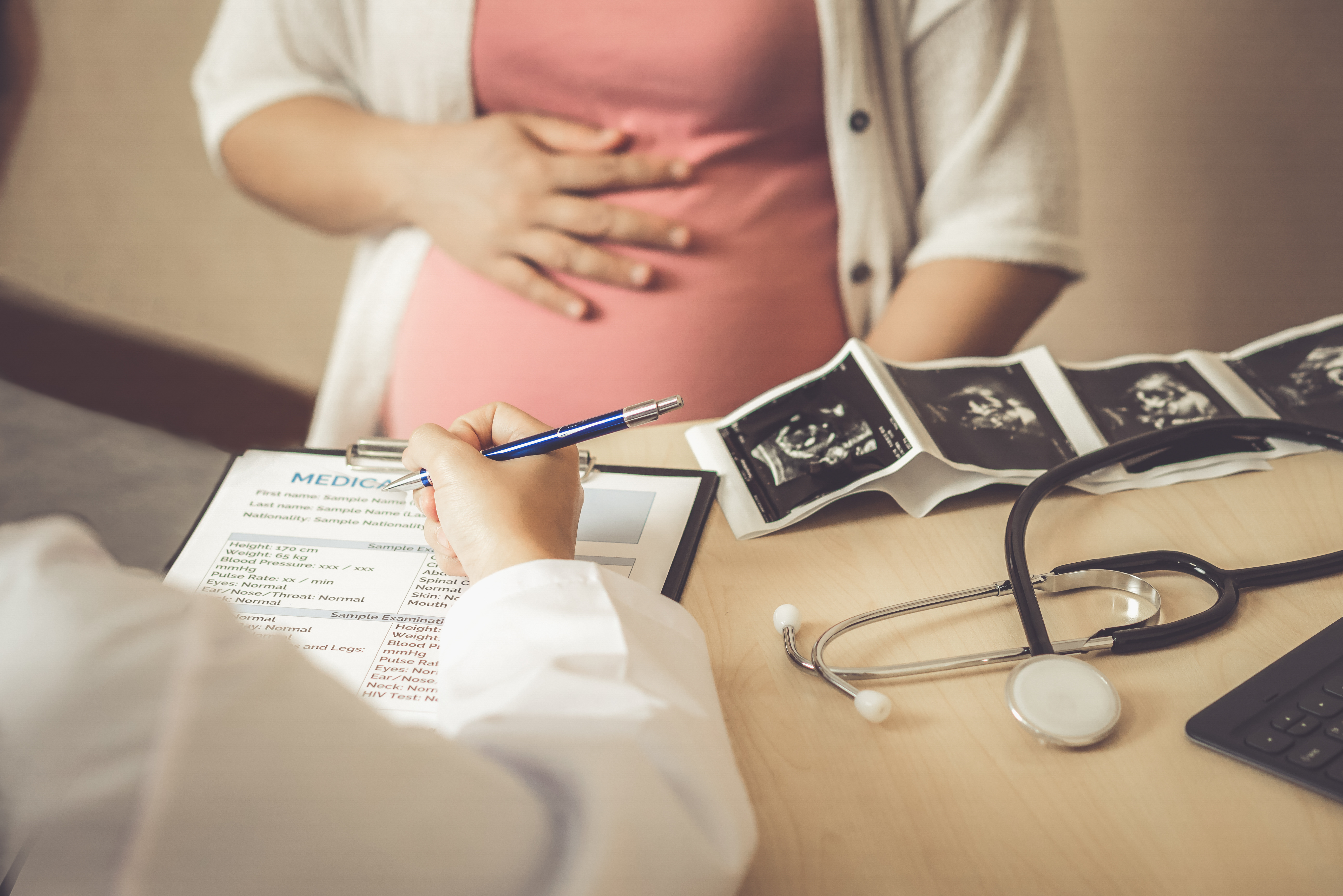 pregnant mother at doctors office