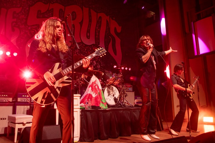 Band jumping on stage