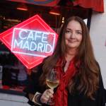 woman in front of sign