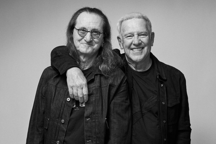 Two guys posing for a photo