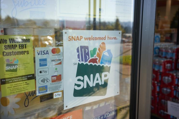 SNAP benefits accepted sign on door