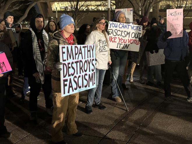 Anti-ICE protesters with signs