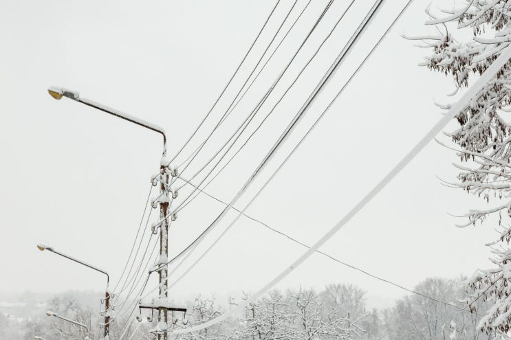 Frozen power lines with ice