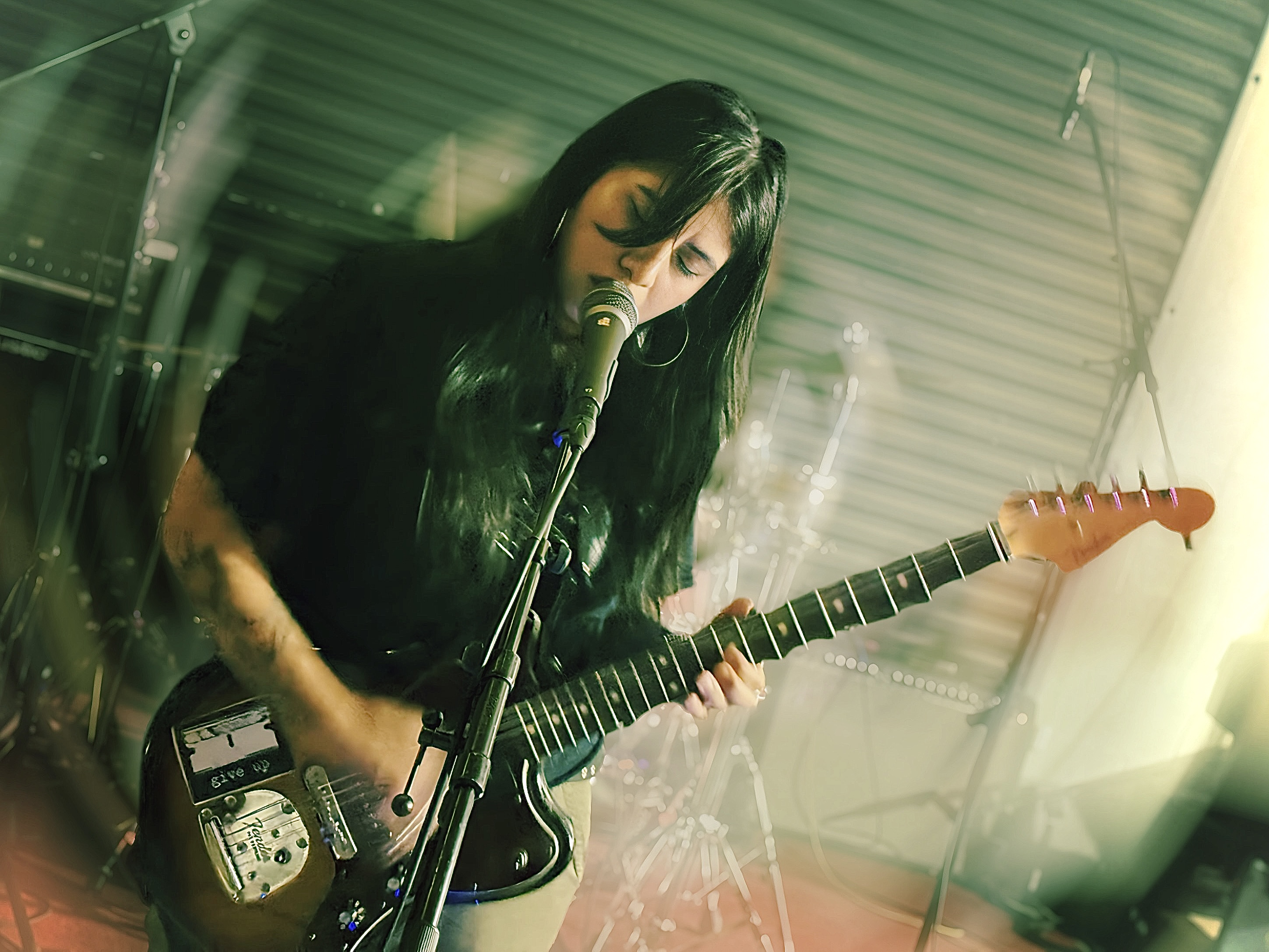 Nikki Perez of Houston's Daze captivates the crowd with her powerful vocals and shoegaze sound.