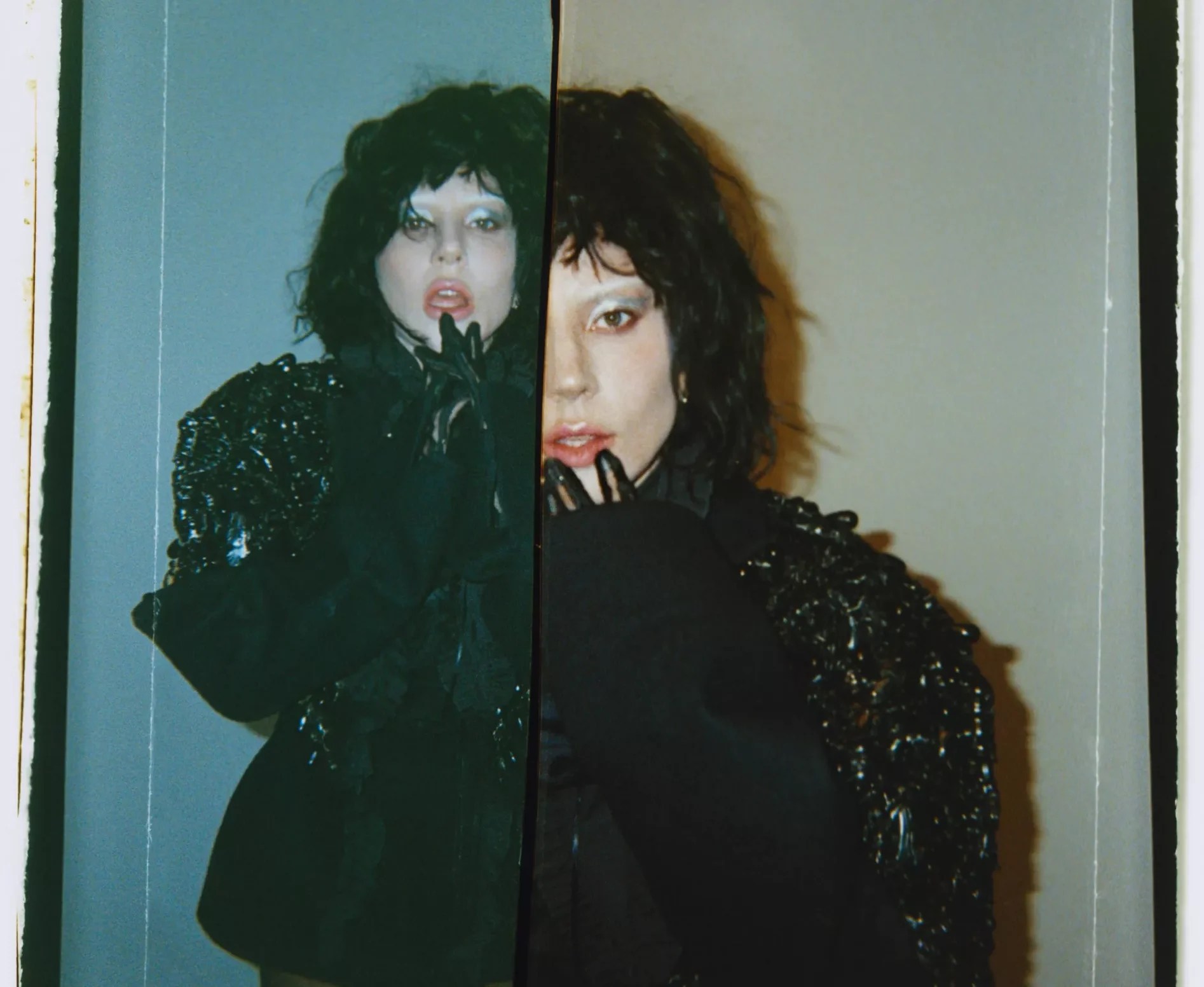 Lady gaga poses in all black outfit for promotional image for her Mayhem album