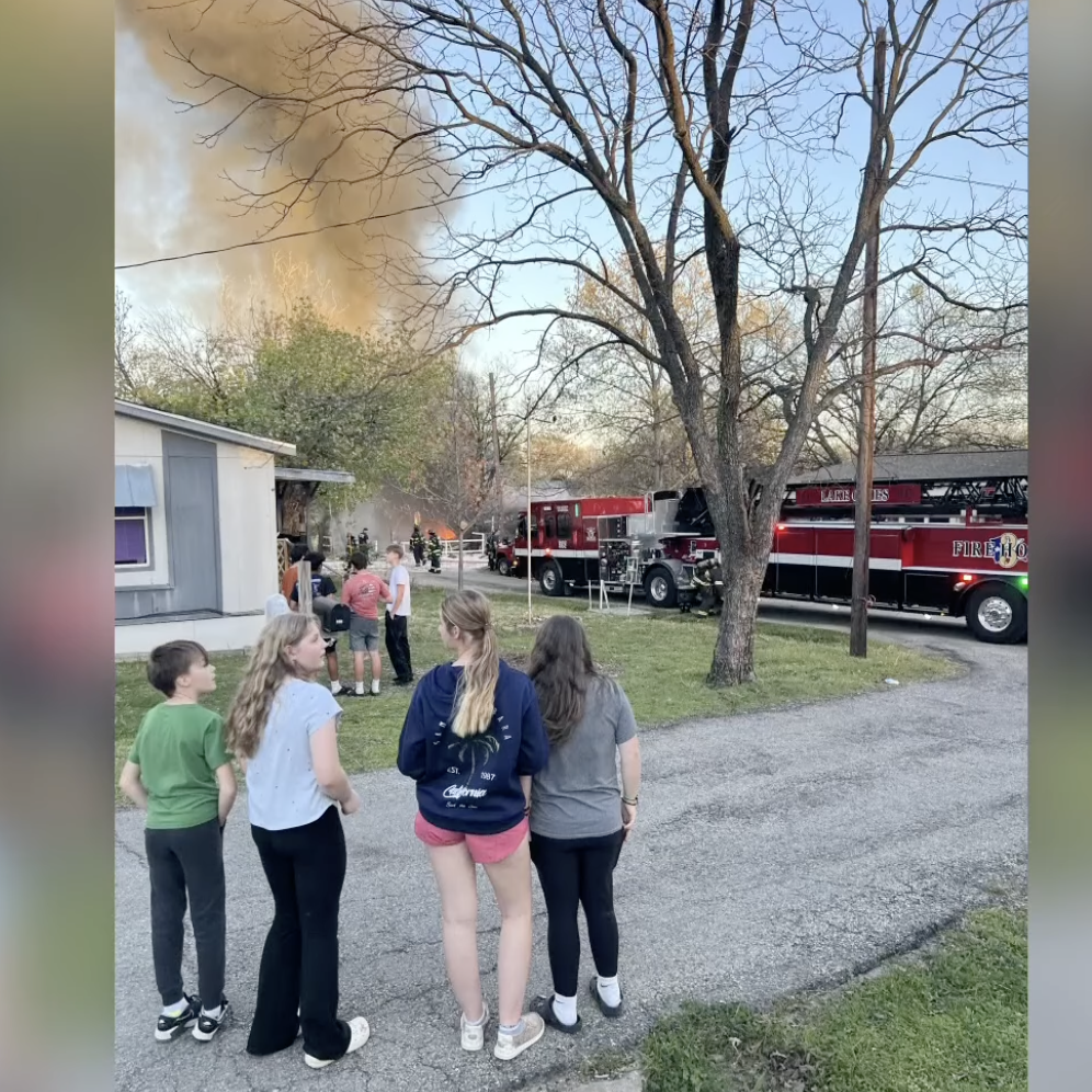Smoke comes from a house after an explosion