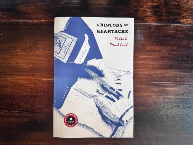 the cover of A History of Heartache, which has a crumpled up pack of Marlborough cigarettes