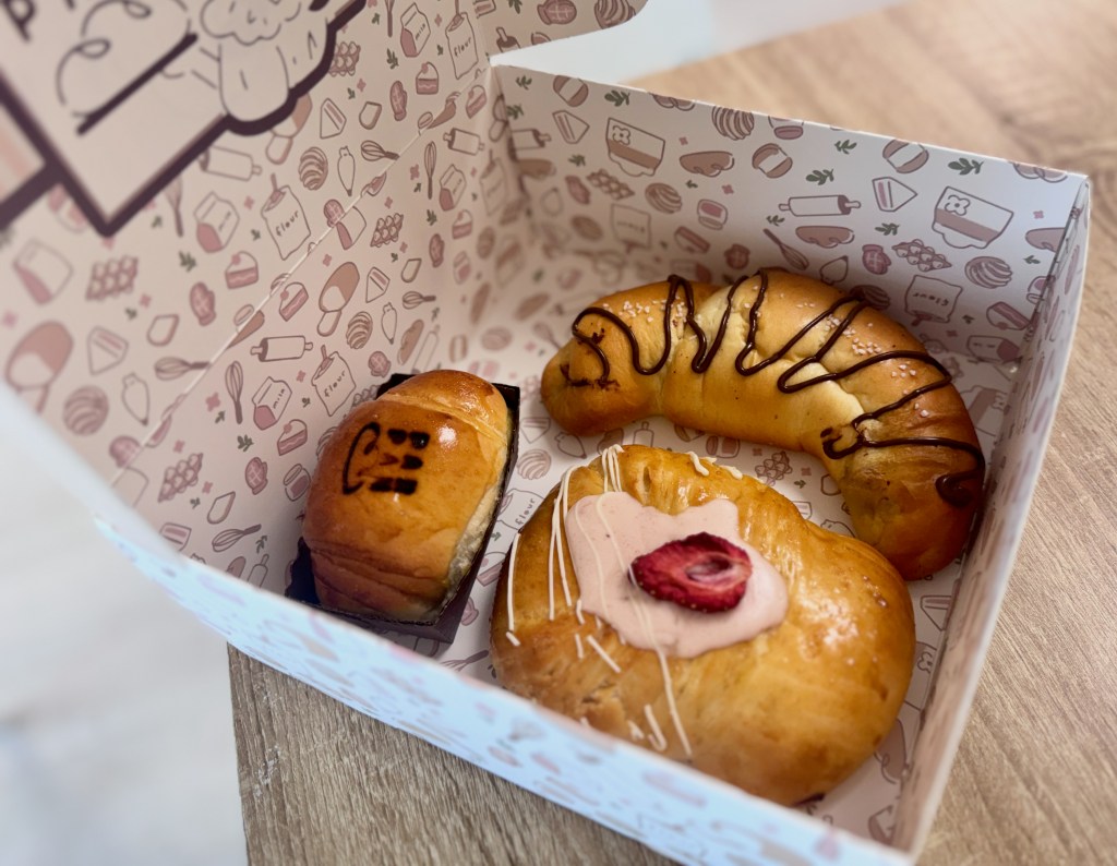 a box with the pastries inside.