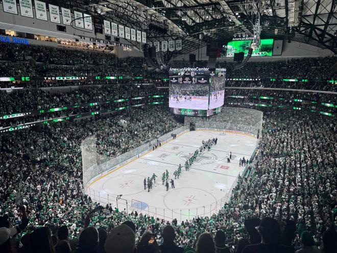 The Dallas Stars shaking hands at center ice