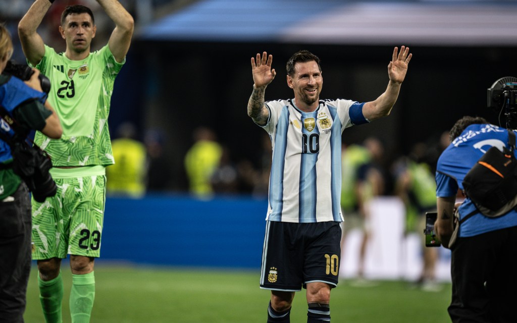 Lionel Messi waves after World Cup match