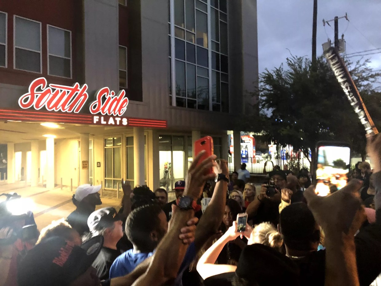 Silence, Pepper Balls and Tension: Botham Jean Protesters Take to the Streets