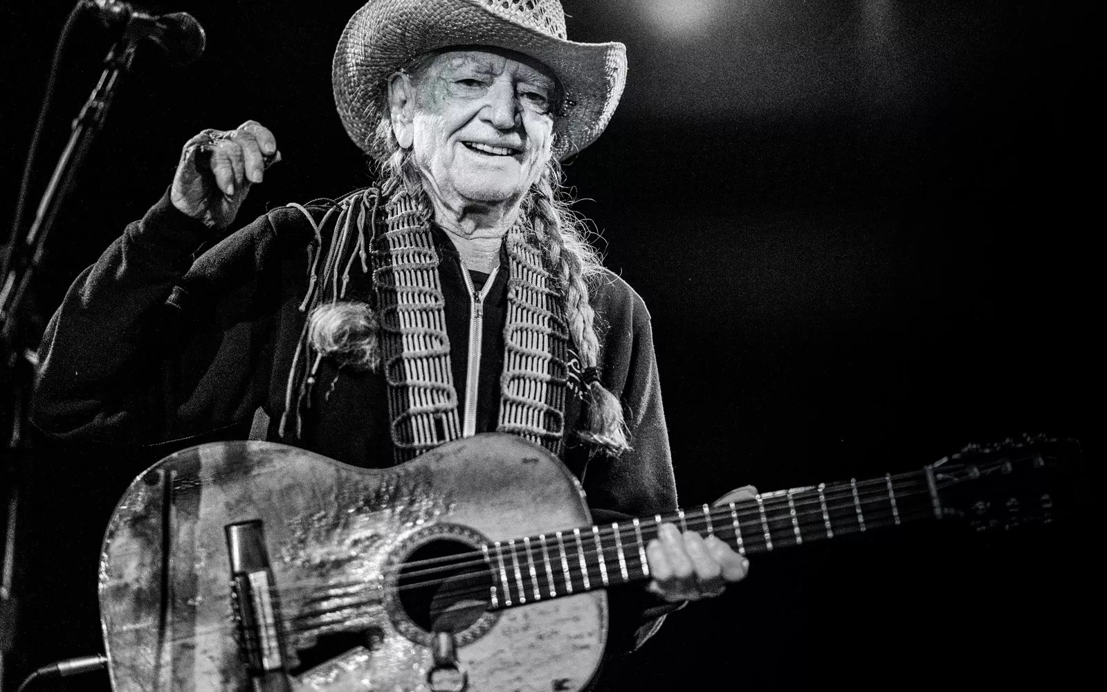 willie nelson playing guitar