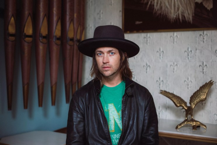 Old 97's singer Rhett Miller, pictured in a black hat, hosts a podcast where he interviews Dallas-based and national artists.