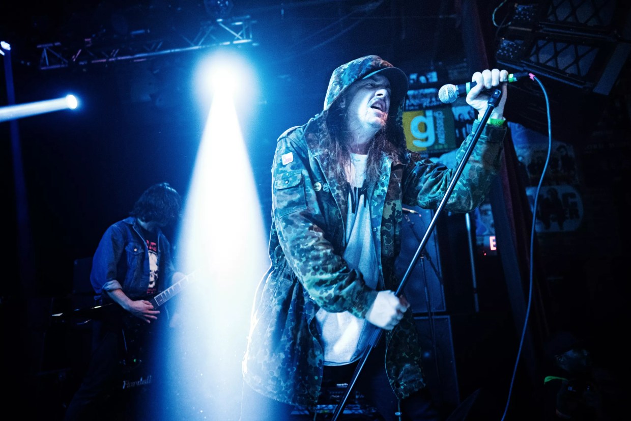 Late Power Trip singer Riley Gale performs in a hoodie. The band is now playing No Values Festival in California.