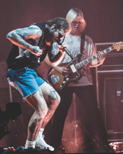 Post Malone dancing the night away at Dos Equis Pavilion in 2023.