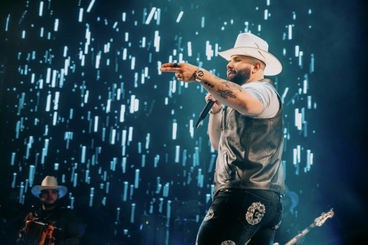 Carin León in concert in Dallas, solo onstage.