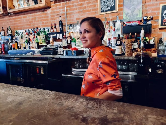 Co-owner Rosie Ildemaro stands at the bar at Strangeways, which she and her brother Eric have operated for 12 years.