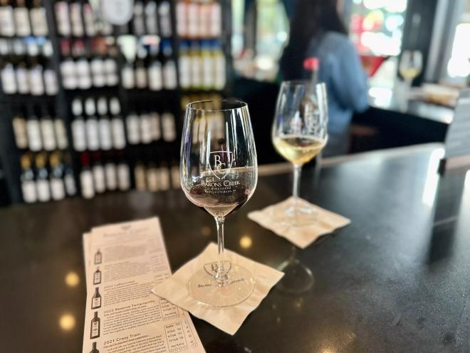 wine glass on bar at barons creek