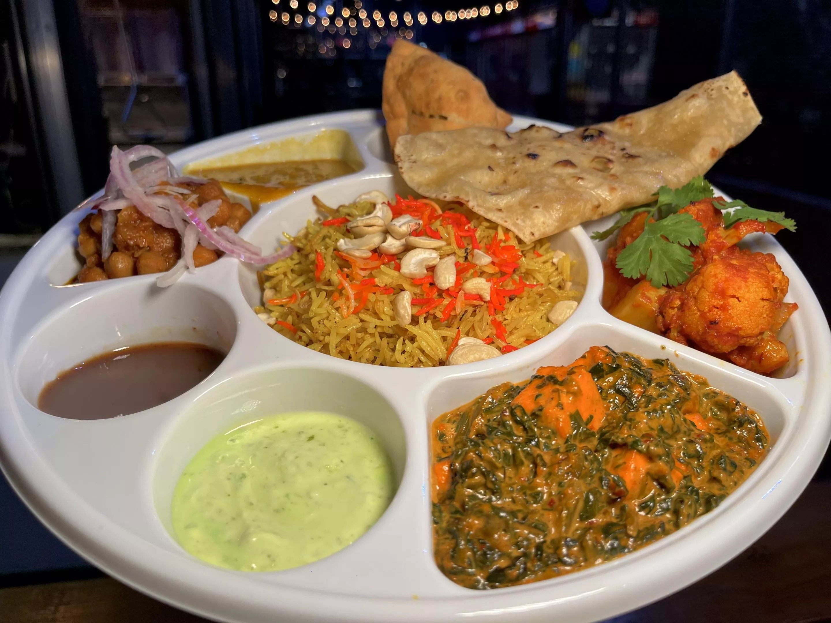 8 Clove's thali plate gives diners the option to sample a little of everything.