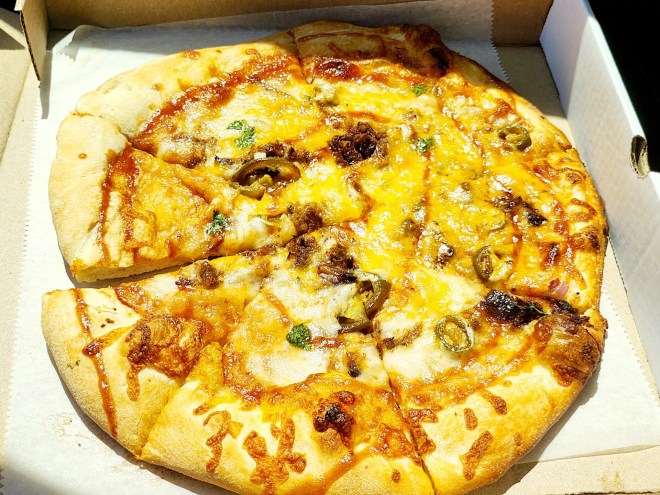 Heavenly Crust's Godspeed brisket pizza