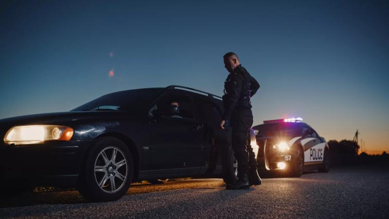 police officer pulling driver over