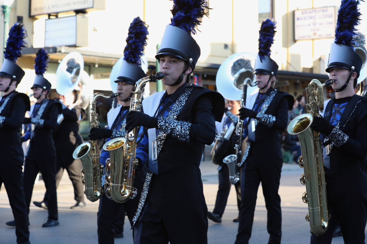 Band members walking down a street