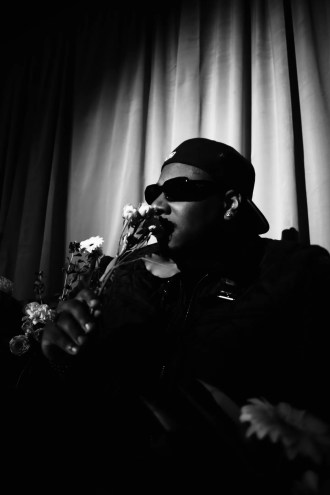 Man smelling flowers