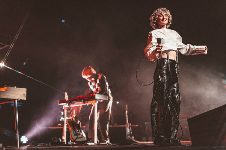 Group performing on stage