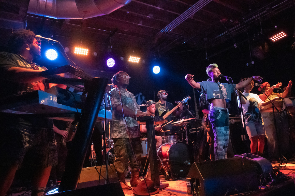 The band is performing on stage